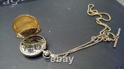 14ct. Gold engr/d case immaculate pocket watch. Solid 9ct. Tbar & 28solid rope chn