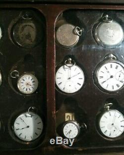 24 antique silver pocket watches in Great pocket watch display case Estate as is
