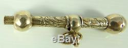 Rare antique gold pocket watch key. Concealed inside an albert chains T bar
