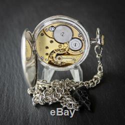 Silver Omega 15 jewel Pocket Watch + Silver Albert Chain