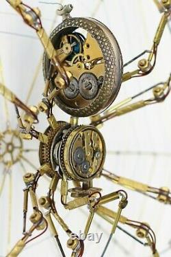 Steampunk spider sculpture made of antique pocket watch parts