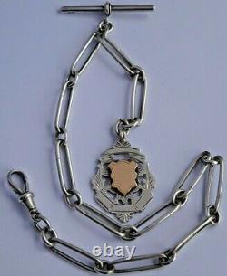 Superb antique solid silver pocket watch albert chain with silver & gold fob. 41.3g